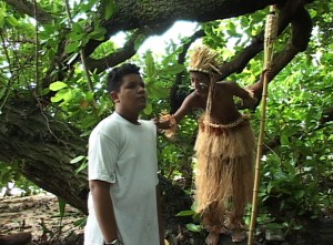 The Noniep (Kyle Trevor) grabs LIki (Randon Jack). Photo: Suzanne Chutaro