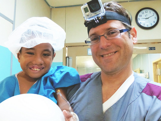 A Canvasback Missions doctor with a young patient.