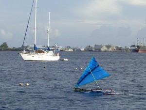 A riwut zooms across the lagoon. Photo: Karen Earnshaw