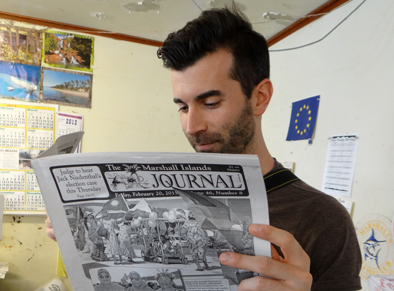 The Washington Post's Dan Zak reads The Marshall Islands Journal (www.marshallislandsjournal.com). Photo: Hilary Hosia