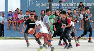 A high-octave game at SGT Solomon Sam Basketball Court between Marshall Islands Middle School and a team from Pohnpei. Photo: Hilary Hosia of the Marshall Islands Journal