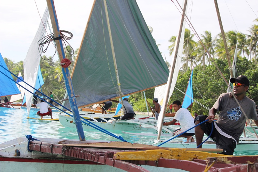 Captains ready their traditional Marshallese canoes for a race. Photo: Rebecca Lathrop