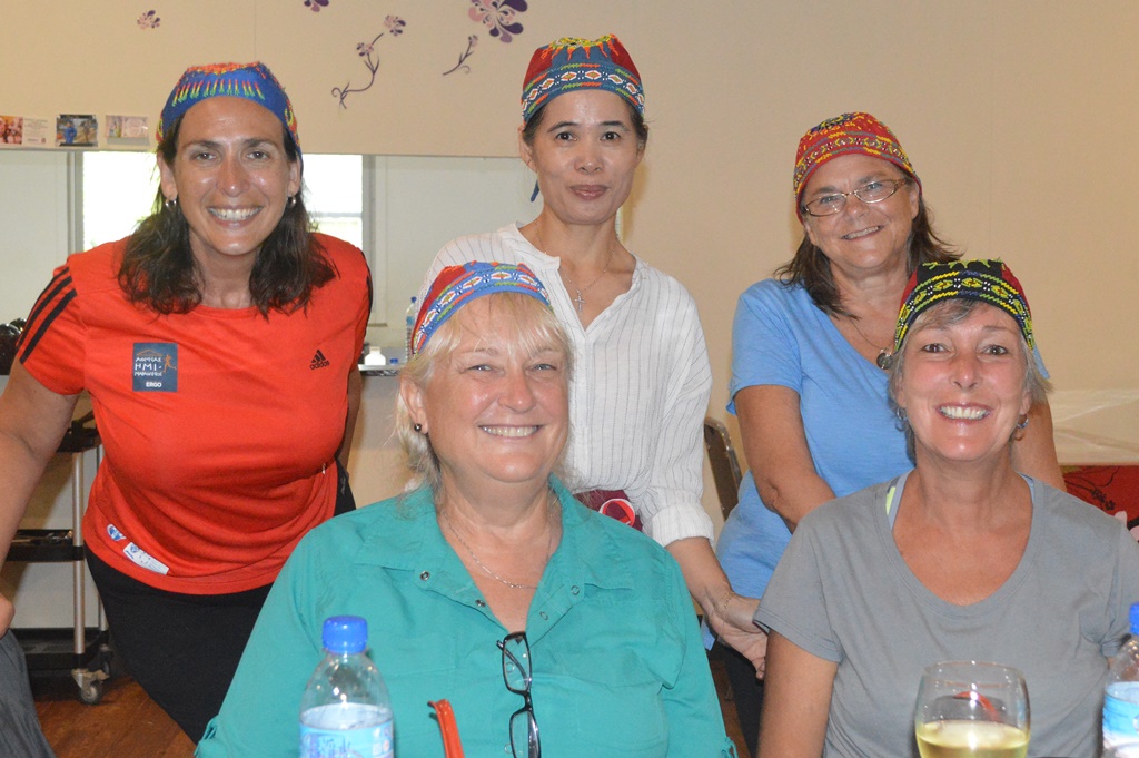 Happy customers at Won Hai Shien wearing their Taiwanese happy caps. Photo: Karen Earnshaw