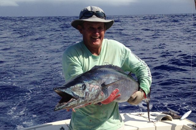 Wasabi Captain Cary Evarts with a 45-pound wahoo. Photo: Willard Lathrop.