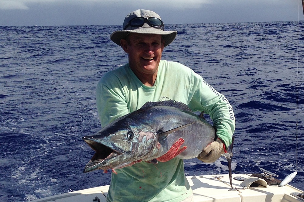 Wasabi Captain Cary Evarts with a 45-pound wahoo. Photo: Willard Lathrop.