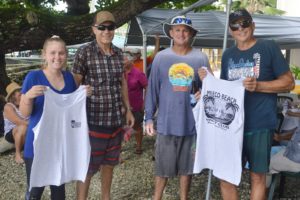 Quartermaster Emily Hudson with runner-up Grant Bilyard, winner Cary Evarts, and Commodore Chuck Gauthier. Photo: Karen Earnshaw