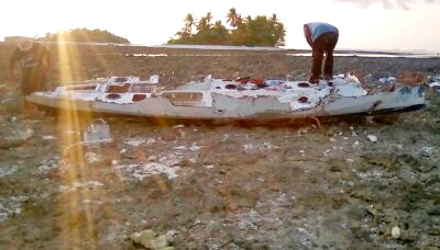 The washed-up hull of Dream Maker at Likiep. Photo: Junior deBrum.