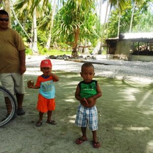 A trio poses for the camera on Lae. Photo: Will Lathrop