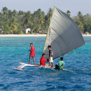 Young boys on summer vacation return home to their village. Photo: Karen Earnshaw