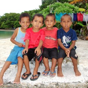 Boys on the beach at Likiep Atoll Photo Karen Earnshaw