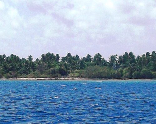 Coming ashore at Ujelang Atoll. Photo Mores Abraham