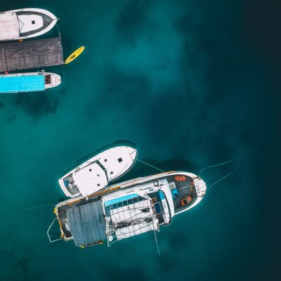 Boats at the RRE Shoreline dock area in Uliga. Photo: Jamison Logan.