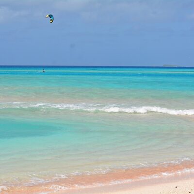 Grant Gardner kite boarding on Rongerik Atoll. Photo: Carley Shetlon on S/V Viandante.