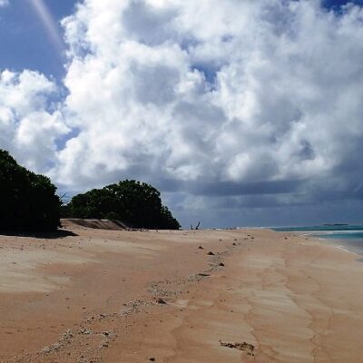 Rain clouds hover on the horizon near Rongerik. Photo: SV Mahili