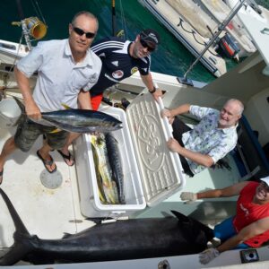 Four guys and their 350-pound marlin and a cooler full of fish. Photo: Karen Earnshaw