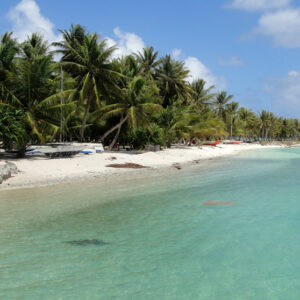 The main village's beach is dotted with canoes. Photo: Karen Earnshaw