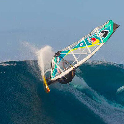 Riding the waves near Beran Island. Photo: Indies Trader
