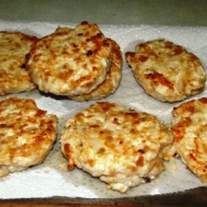 As you cook the batches of burgers, place them on a paper towel to remove extra moisture. Photo: Karen Earnshaw