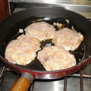 Fry the fish patties in olive oil for just three or four minutes, turning once. Photo: Karen Earnshaw