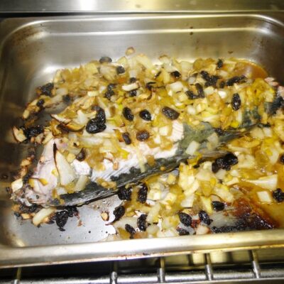 The stuffed fish in the roasting pan. Photo: Karen Earnshaw