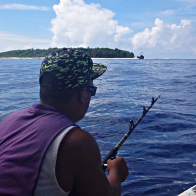Fishing on the way to Jemo Island. Note the wreck on the right. Photo: Nicky deBrum