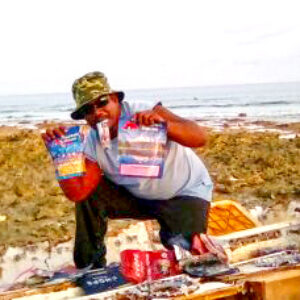 Jackie Jacklick checks out the snacks found on board the boat. Photo: Junior deBrum.