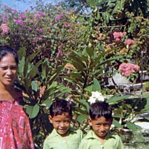 Do you know this woman and her children who are perhaps twins?