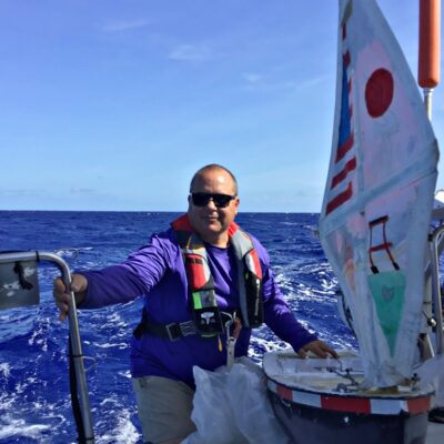 Commodore Mark Stearns relaunches the rebuilt SV Liberty from the stern of his yacht Uno Mas. On June 14, 2023, the little boat was about 250 nautical miles from New Ireland, Papua New Guinea. Photo: Angie Stearns.