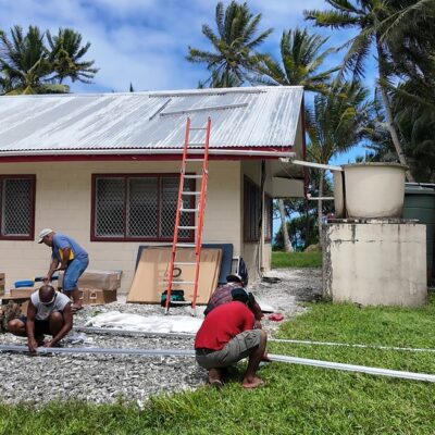 February 2026 the Juren Ae took a Ministry of Health group to Ailinglaplap. Here a team installs solar panels on the health clinic in Woja.