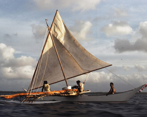A traditional Marshall Islands canoe in the waters off Ujelang in the 1970s.