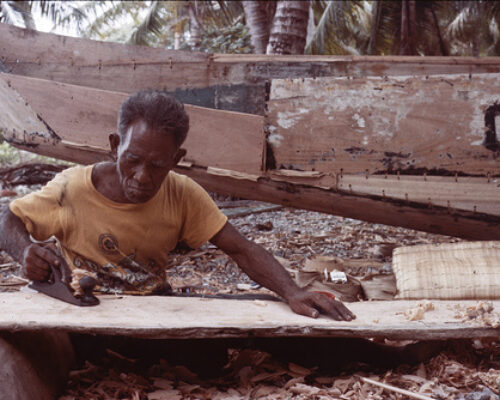 Luta building a canoe on Ujelang in the 1970s.
