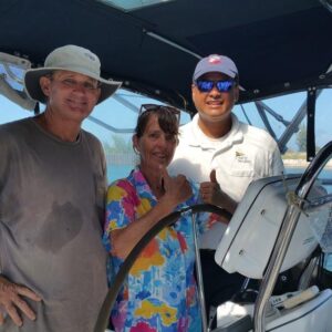 Cary Evarts, Karen Earnshaw, and Wake Island site manager Michael Marrero. Photo: Captain Allen Jaime.