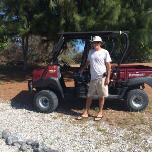 Cary Evarts with the Wake Island transport known as a Mule. Photo: Karen Earnshaw