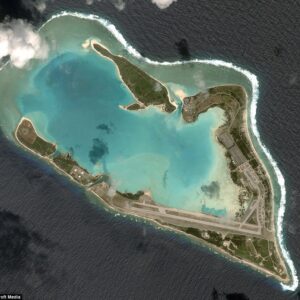 An aerial shot of Wake Island. The marina is to the left of the runway. Photo: Unknown