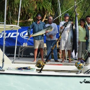 Weighing in Wasabi's catch. Photo: Karen Earnshaw