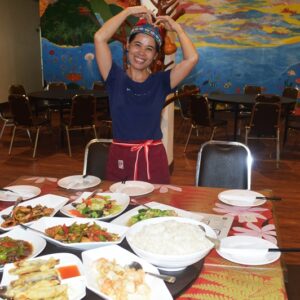 The chef poses with a selection of her best dishes. Photo: Karen Earnshaw